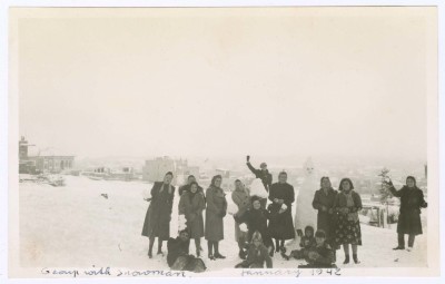 A Photograph of People Standing in the Snow, January 1942