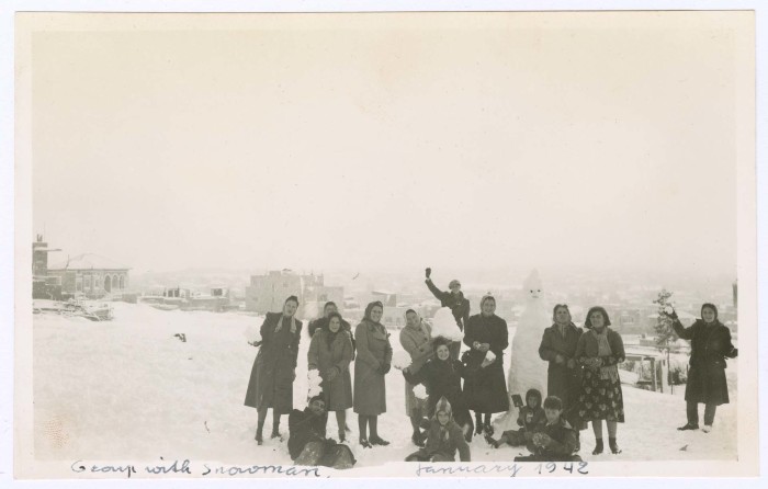 A Photograph of People Standing in the Snow, January 1942