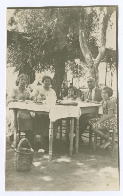 Khalil Sakakini and Family Around a Dining Table 