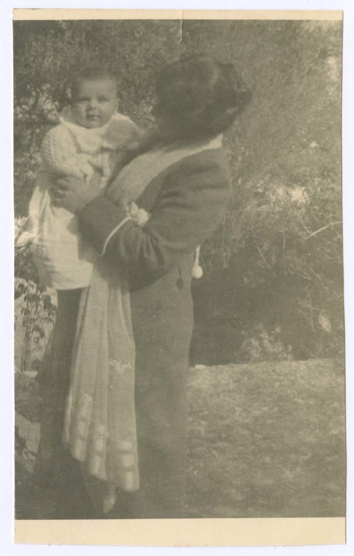 A Photograph of a Woman Holding a Child