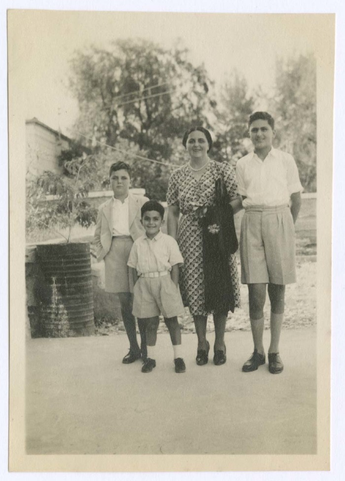 A Photograph of a Woman and Her Three Children