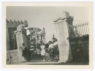 A Photograph of a Group of the American College in Beirut Students at the College Gates