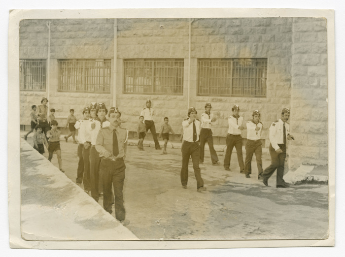 A Photograph of Some Members of the Papal Scout Troop of Beit Jala Marching in Line