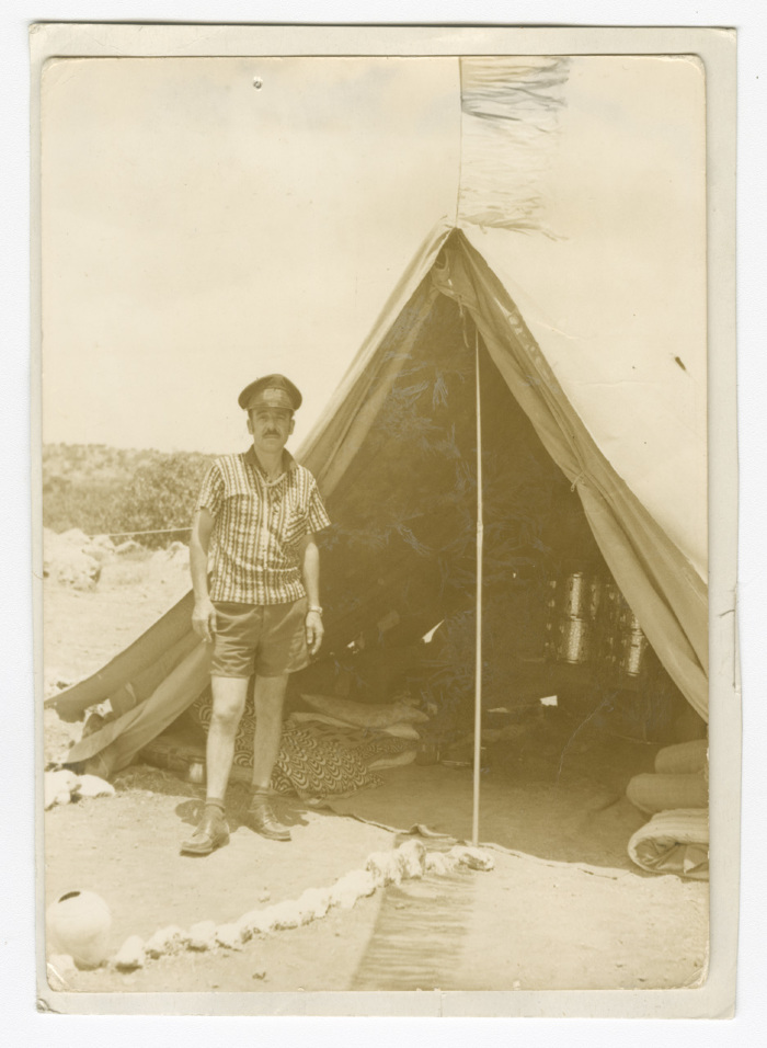 A Photograph of a Member of the Papal Scout Troop of Beit Jala on a Campsite
