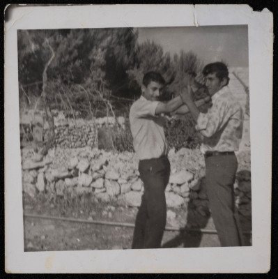 A Photograph of Tayeʿ ar-Rimawy and Hassab Qaddura in Beit Rima Village 