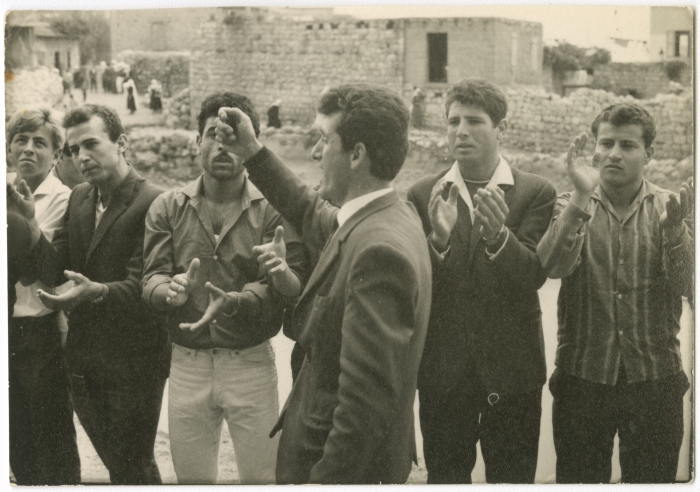 Shahin Jeries organizes Palestinian Zajal at one of weddings, 1960s