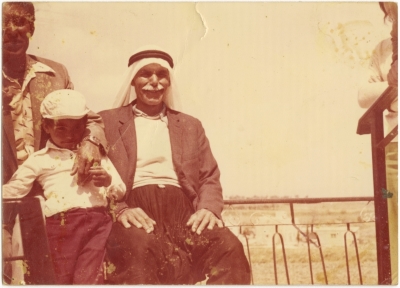 Mohammad al-Zeni with his son and his grandchild, 1960s
