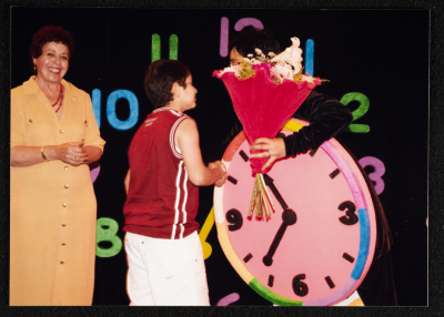 A Photograph of Puppeteer Arin ʿĀbdy at the Honorary Ceremony Held for the "Ṣah Ṣah" Theatre Staff