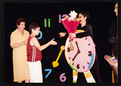 A Photograph of Puppeteer Arin ʿĀbdy at the Honorary Ceremony Held for the "Ṣah Ṣah" Theatre Staff