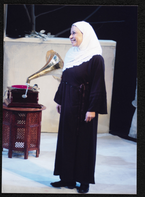 A Photograph of Sanaʾ Salhab During the Theatrical Performance of "Ghuyum Fi Rihla Jabaleya", al-Midan Theatre 
