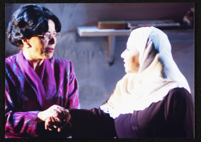 A Photograph of Salwa Naqara and Sanaʾ Salhab During the Theatrical Performance of "Ghuyum Fi Rihla Jabaleya", al-Midan Theatre 
