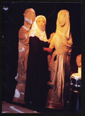 A Photograph of Sanaʾ Salhab During the Theatrical Performance of "Ghuyum Fi Rihla Jabaleya", al-Midan Theatre 

