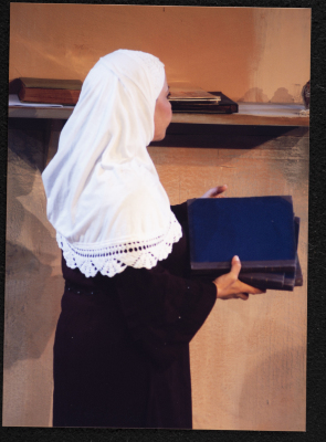 A Photograph of Sanaʾ Salhab During the Theatrical Performance of "Ghuyum Fi Rihla Jabaleya", al-Midan Theatre 
