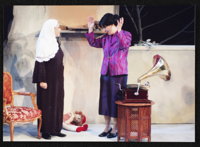 A Photograph of Salwa Naqara and Sanaʾ Salhab During the Theatrical Performance of "Ghuyum Fi Rihla Jabaleya", al-Midan Theatre 
