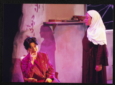 A Photograph of Salwa Naqara and Sanaʾ Salhab During the Theatrical Performance of "Ghuyum Fi Rihla Jabaleya", al-Midan Theatre 
