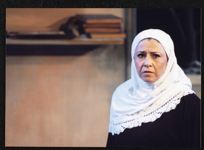A Photograph of Sanaʾ Salhab During the Theatrical Performance of "Ghuyum Fi Rihla Jabaleya", al-Midan Theatre 
