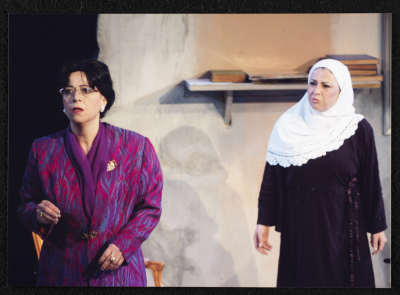 A Photograph of Salwa Naqara and Sanaʾ Salhab During the Theatrical Performance of "Ghuyum Fi Rihla Jabaleya", al-Midan Theatre 
