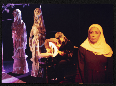 A Photograph of Sanaʾ Salhab During the Theatrical Performance of "Ghuyum Fi Rihla Jabaleya", al-Midan Theatre 
