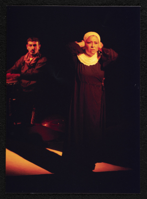 A Photograph of Sanaʾ Salhab During the Theatrical Performance of "Ghuyum Fi Rihla Jabaleya", al-Midan Theatre 
