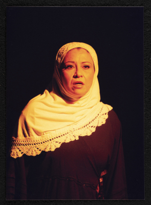 A Photograph of Sanaʾ Salhab During the Theatrical Performance of "Ghuyum Fi Rihla Jabaleya", al-Midan Theatre 

