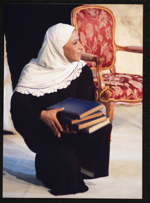 A Photograph of Sanaʾ Salhab During the Theatrical Performance of "Ghuyum Fi Rihla Jabaleya", al-Midan Theatre 
