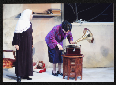 A Photograph of Salwa Naqara and Sanaʾ Salhab During the Theatrical Performance of "Ghuyum Fi Rihla Jabaleya", al-Midan Theatre 
