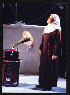 A Photograph of Sanaʾ Salhab During the Theatrical Performance of "Ghuyum Fi Rihla Jabaleya", al-Midan Theatre 
