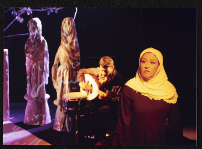 A Photograph of Sanaʾ Salhab During the Theatrical Performance of "Ghuyum Fi Rihla Jabaleya", al-Midan Theatre 
