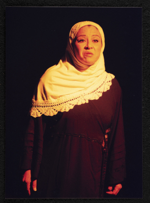 A Photograph of Sanaʾ Salhab During the Theatrical Performance of "Ghuyum Fi Rihla Jabaleya", al-Midan Theatre 
