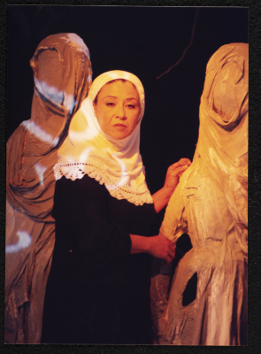 A Photograph of Sanaʾ Salhab During the Theatrical Performance of "Ghuyum Fi Rihla Jabaleya", al-Midan Theatre 
