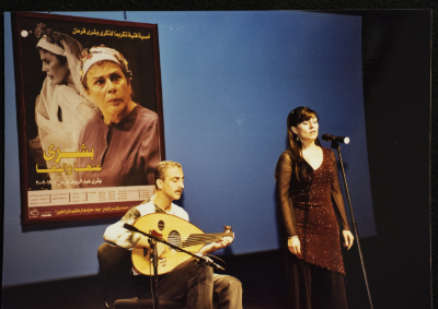 A Photograph of ʾAmal Murkus and Saʿid Murad Singing at the Memorial Service Held in Honour of Actress Bushra Qaraman