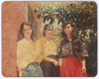 A Photograph of Fatmeh, Zainab, and Muntaha ʿaṣleh in front of their House, 1980s



