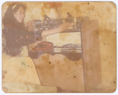 A Photograph of Muntaha ʿaṣleh while Working on a Sound System, 1989