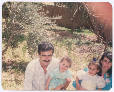 A Family Photograph of Ali al-Hassan and his Wife Zainab and their Children, 1980s 
 
