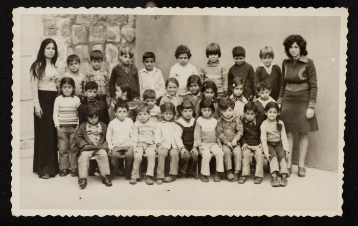 A Photograph of Sur Baher Students with Their Teacher Nuha Yaʿish 