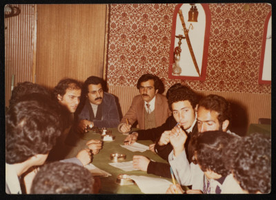 A Photograph of Journalists at a Meeting 