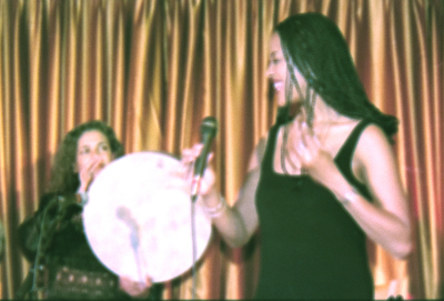A Photograph of a Joint Performance by Sabreen Group and an American Band, 1995