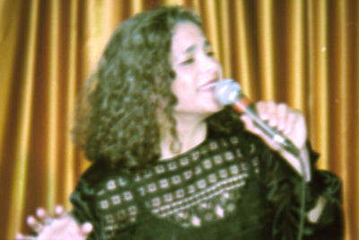 A Photograph of a Joint Performance by Sabreen Group and an American Band, 1995