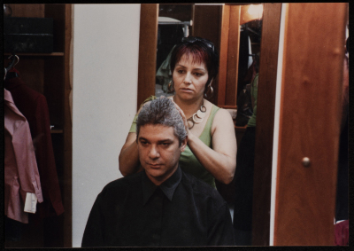 A Photograph of ʾEyad Shtay Backstage with the Hairdresser Before the Theatrical Performance "Bayad al-Aynayn", al-Midan Theatre, 2005	