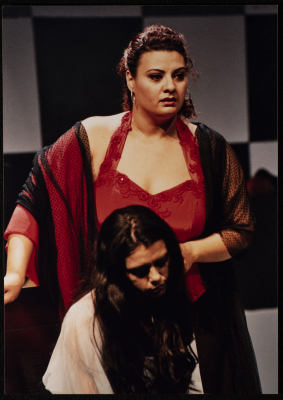 A Photograph of Nisrin Faʿur and Āmal Qays During the Theatrical Performance of "Bayad al-Aynayn", al-Midan Theatre 
