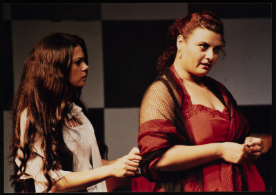 A Photograph of Nisrin Faʿur and Āmal Qays During the Theatrical Performance "Bayad al-Aynayn", al-Midan Theatre, 2005

