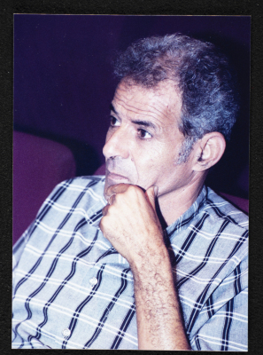 A Photograph of the Director of the "Buʾs Wa Ruʿb Reich ath-Thaleth" Riyad Maṣarweh at Rehearsals 