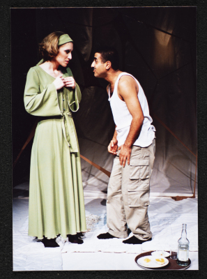 A Photograph of Mahmud Qadah and Salma Khaybun During the Theatrical Performance "Ahlam Shaqeyyeh", al-Midan Theatre, 2001	