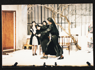 A Photograph of the Theatrical Performance "Sayyedat al-Bayt", al-Midan Theatre, 2000	