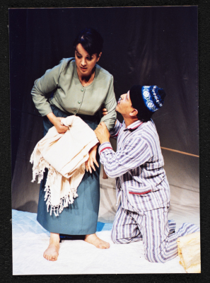 A Photograph of Muhammad ʿudetallah and Rawda Sulayman During the Theatrical Performance "Ahlam Shaqeyyeh", al-Midan Theatre, 2001