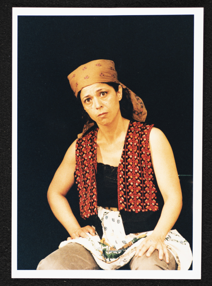 A Photograph of Salwa Naqara During the Theatrical Performance 