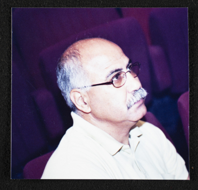 A Photograph of a Theatre Staff Member at the "Buʾs Wa Ruʿb Reich ath-Thaleth" Rehearsals, al-Midan Theatre, 2002