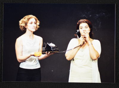 A Photograph of Fatin Khury and Salma Khshaybun During the Theatrical Performance "Buʾs Wa Ruʿb Reich ath-Thaleth", al-Midan Theatre, 2002