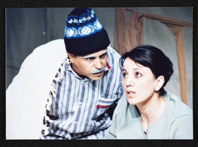 A Photograph of Muhammad ʿudetallah and Rawda Sulayman During the Theatrical Performance "Ahlam Shaqeyyeh", al-Midan Theatre, 2001