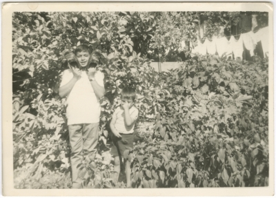 Two children at an orchard in Arrabeh